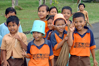 Bali schoolchildren on their way home